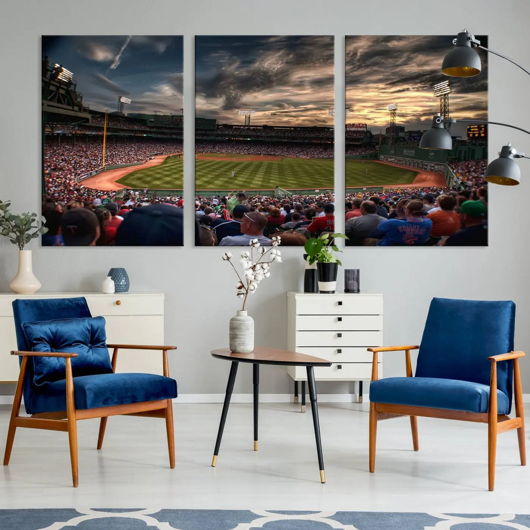 The Boston Red Sox Baseball Team Print, featuring Massachusetts's Fenway Park Stadium, brings charm and a gallery-quality finish to a cozy living room. It captures the essence of a crowded baseball stadium at sunset.