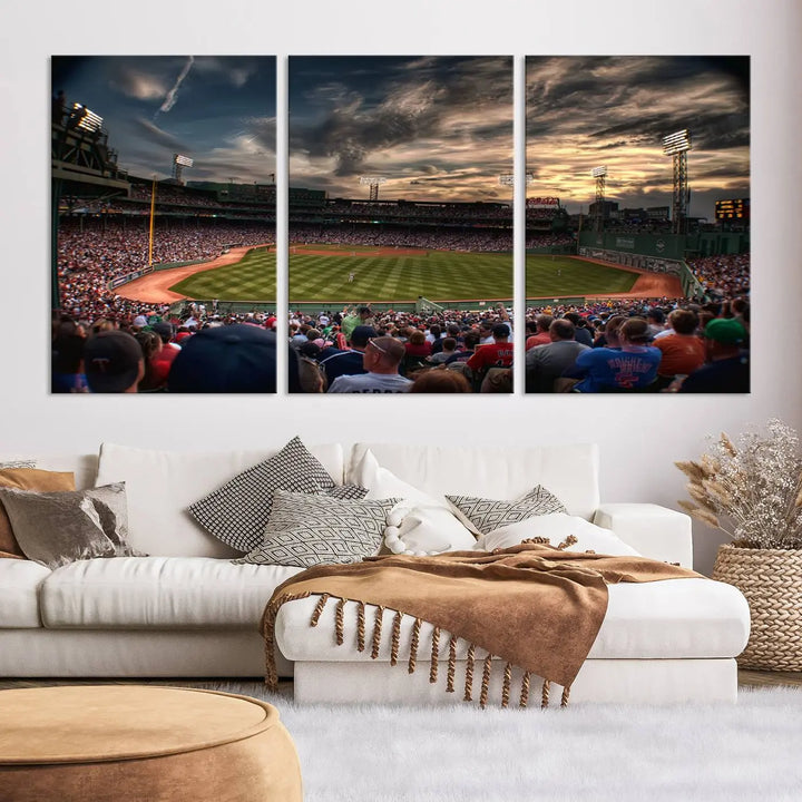 The Boston Red Sox Baseball Team Print, featuring Massachusetts's Fenway Park Stadium, brings charm and a gallery-quality finish to a cozy living room. It captures the essence of a crowded baseball stadium at sunset.