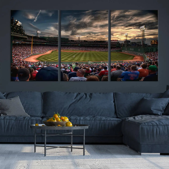 The Boston Red Sox Baseball Team Print, featuring Massachusetts's Fenway Park Stadium, brings charm and a gallery-quality finish to a cozy living room. It captures the essence of a crowded baseball stadium at sunset.