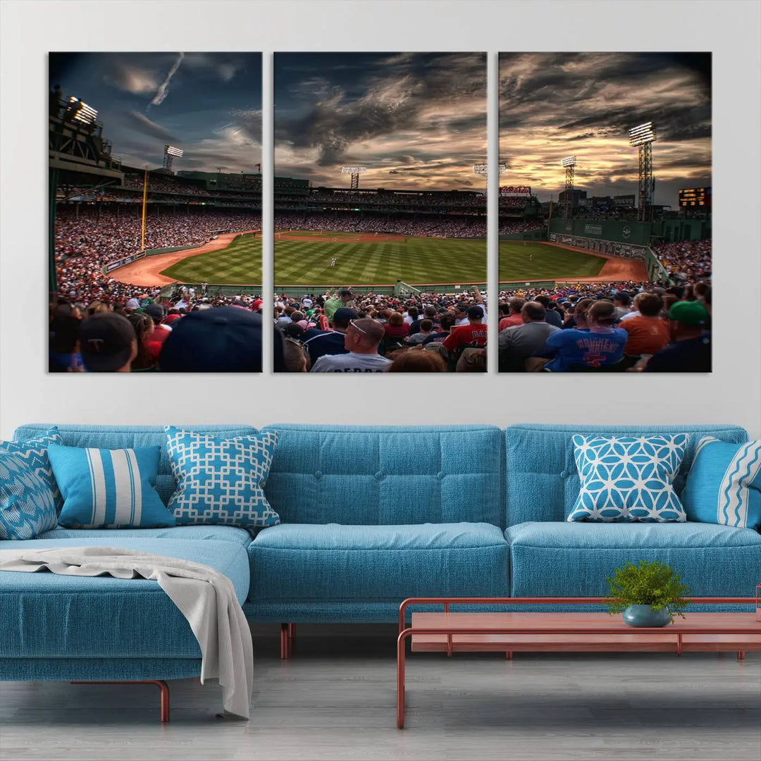 The Boston Red Sox Baseball Team Print, featuring Massachusetts's Fenway Park Stadium, brings charm and a gallery-quality finish to a cozy living room. It captures the essence of a crowded baseball stadium at sunset.