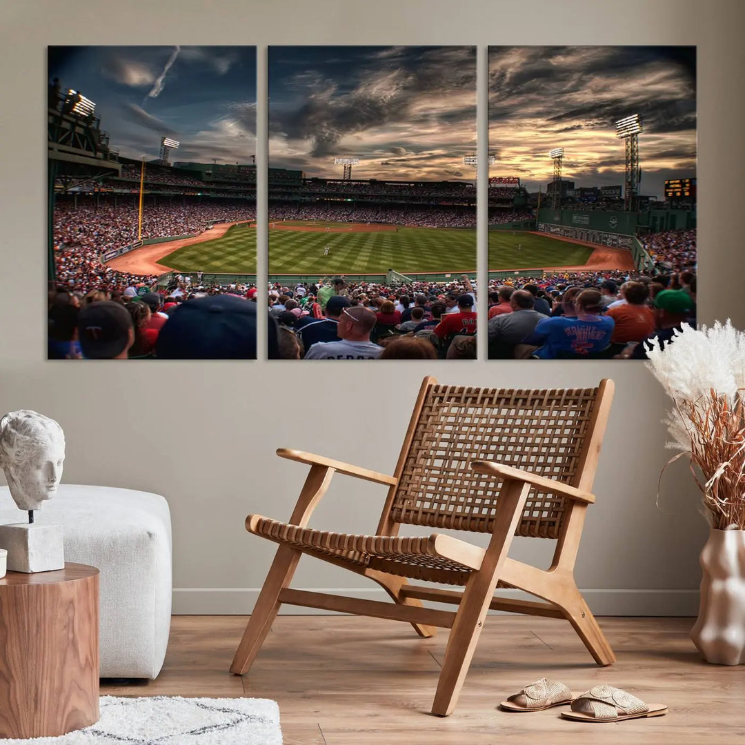 The Boston Red Sox Baseball Team Print, featuring Massachusetts's Fenway Park Stadium, brings charm and a gallery-quality finish to a cozy living room. It captures the essence of a crowded baseball stadium at sunset.