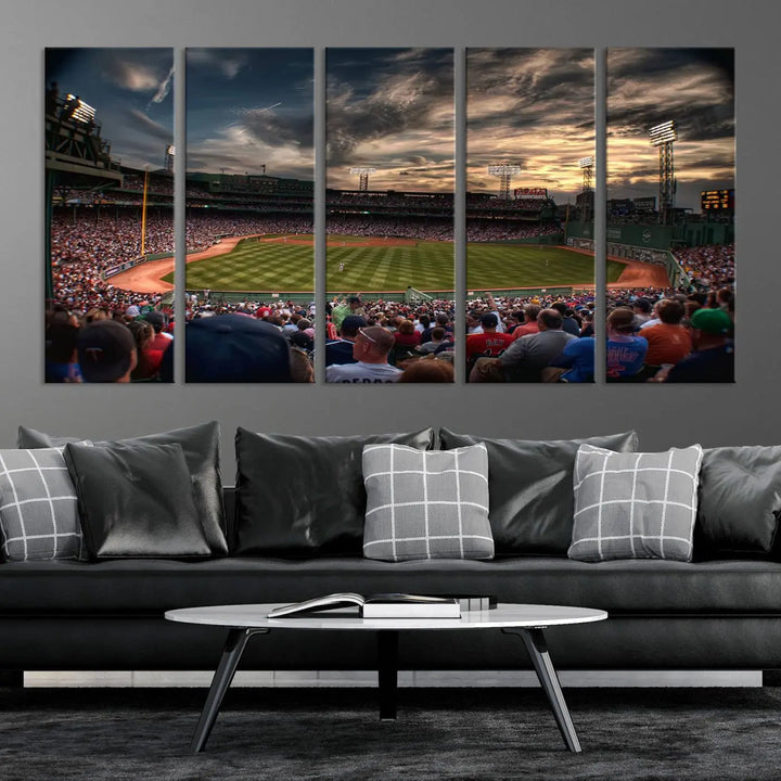 The Boston Red Sox Baseball Team Print, featuring Massachusetts's Fenway Park Stadium, brings charm and a gallery-quality finish to a cozy living room. It captures the essence of a crowded baseball stadium at sunset.