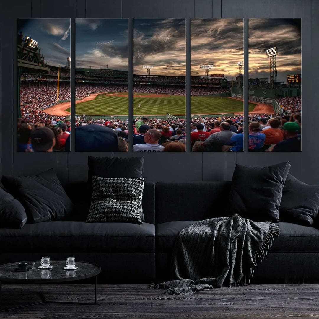 The Boston Red Sox Baseball Team Print, featuring Massachusetts's Fenway Park Stadium, brings charm and a gallery-quality finish to a cozy living room. It captures the essence of a crowded baseball stadium at sunset.