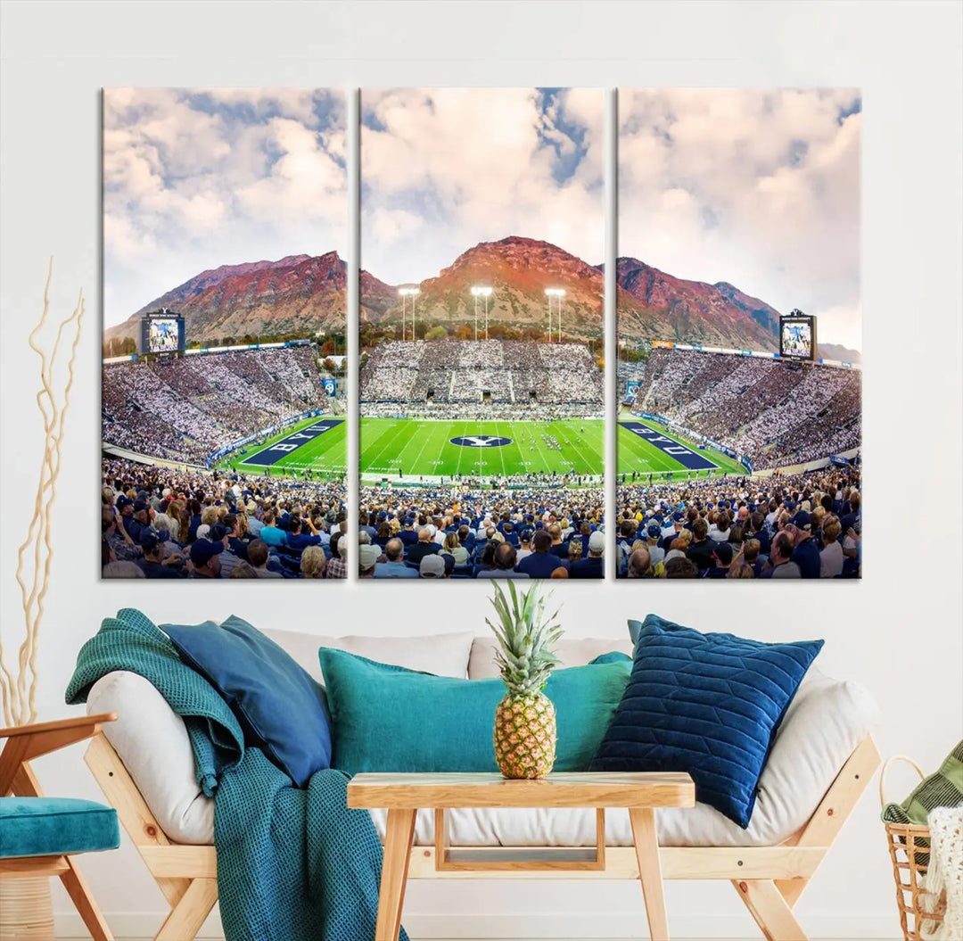 The Brigham Young University Cougars Football Team Print, featuring Provo's LaVell Edwards Stadium set against a mountainous backdrop, is beautifully rendered on museum-quality canvas.