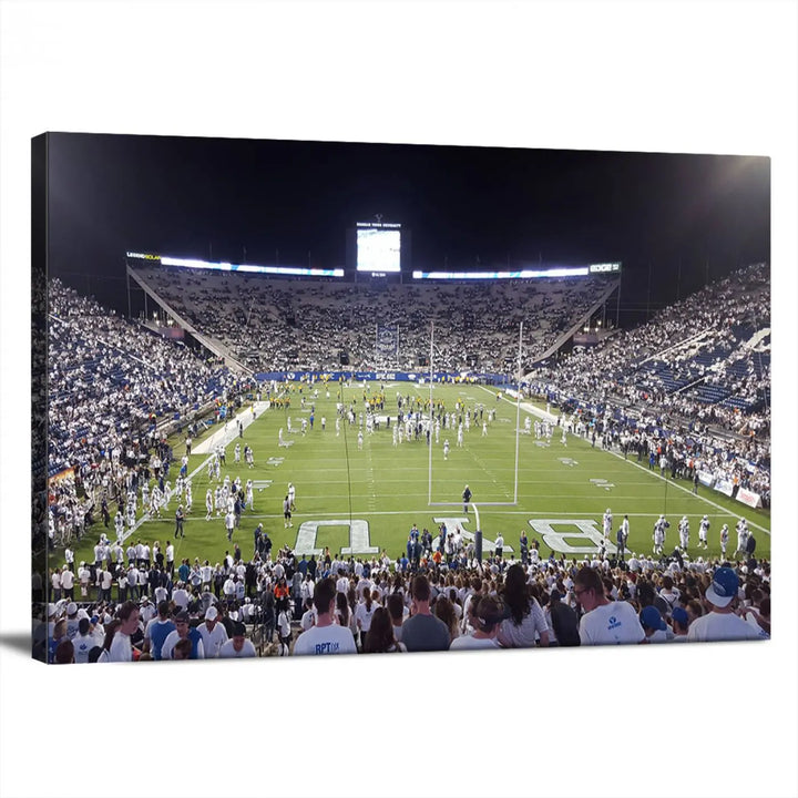 The living room is enhanced by a stunning triptych featuring the Brigham Young University Cougars Football Team Print. This premium canvas captures the vibrant atmosphere of Provo's LaVell Edwards Stadium at night, vividly portraying spectators and players on a well-lit field to bring an electrifying ambiance into your home.