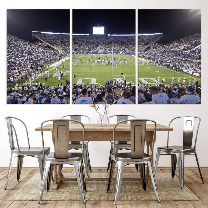 The living room is enhanced by a stunning triptych featuring the Brigham Young University Cougars Football Team Print. This premium canvas captures the vibrant atmosphere of Provo's LaVell Edwards Stadium at night, vividly portraying spectators and players on a well-lit field to bring an electrifying ambiance into your home.