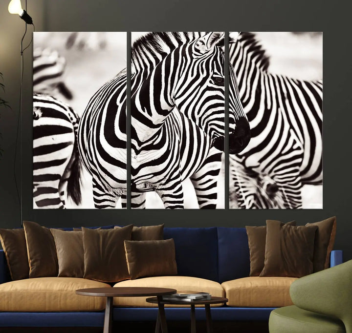 The room features the striking "Brilliant Zebra Photography Art Canvas Print Black and White," a triptych that showcases bold black and white stripes. This artwork is skillfully gallery wrapped on museum-quality canvas.