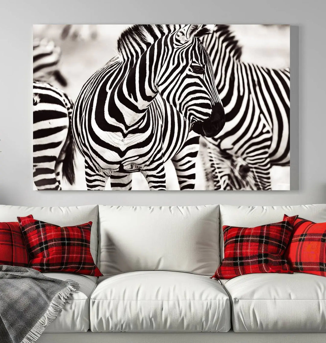 The room features the striking "Brilliant Zebra Photography Art Canvas Print Black and White," a triptych that showcases bold black and white stripes. This artwork is skillfully gallery wrapped on museum-quality canvas.