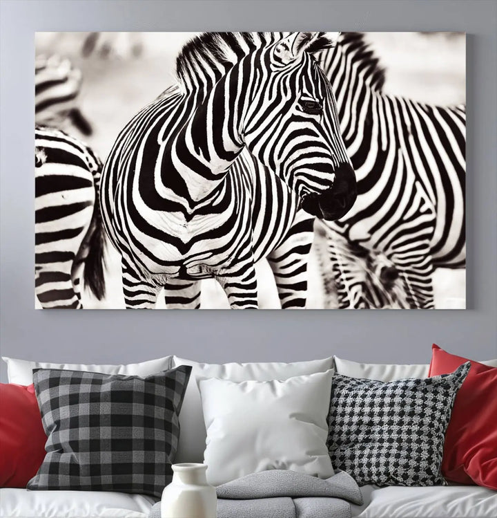 The room features the striking "Brilliant Zebra Photography Art Canvas Print Black and White," a triptych that showcases bold black and white stripes. This artwork is skillfully gallery wrapped on museum-quality canvas.