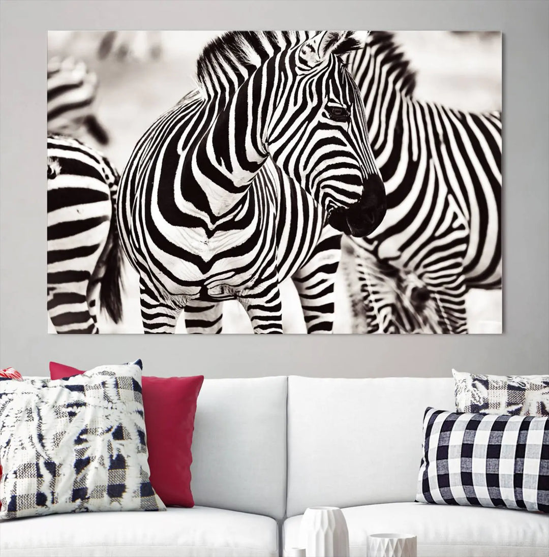 The room features the striking "Brilliant Zebra Photography Art Canvas Print Black and White," a triptych that showcases bold black and white stripes. This artwork is skillfully gallery wrapped on museum-quality canvas.