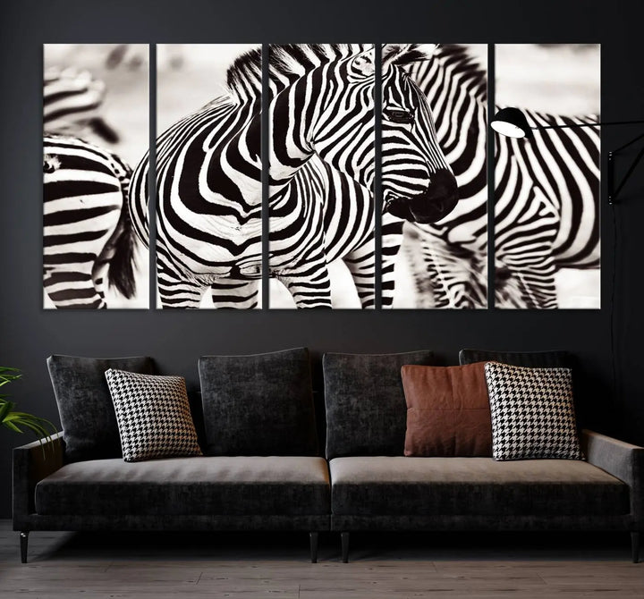 The room features the striking "Brilliant Zebra Photography Art Canvas Print Black and White," a triptych that showcases bold black and white stripes. This artwork is skillfully gallery wrapped on museum-quality canvas.