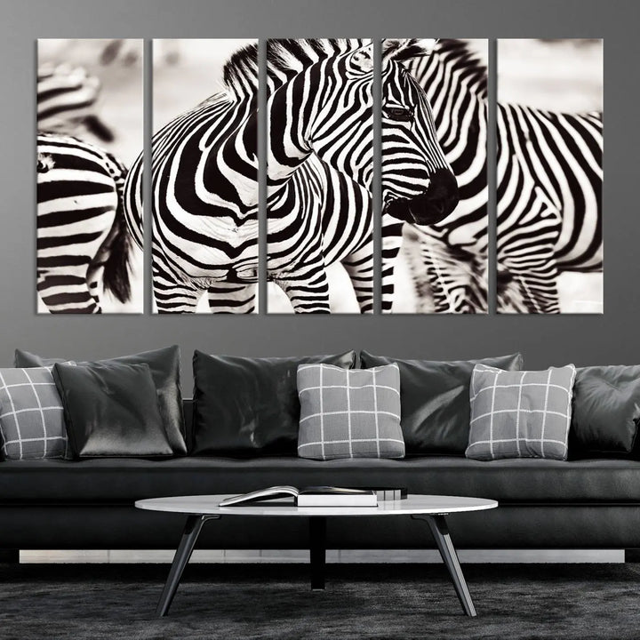 The room features the striking "Brilliant Zebra Photography Art Canvas Print Black and White," a triptych that showcases bold black and white stripes. This artwork is skillfully gallery wrapped on museum-quality canvas.