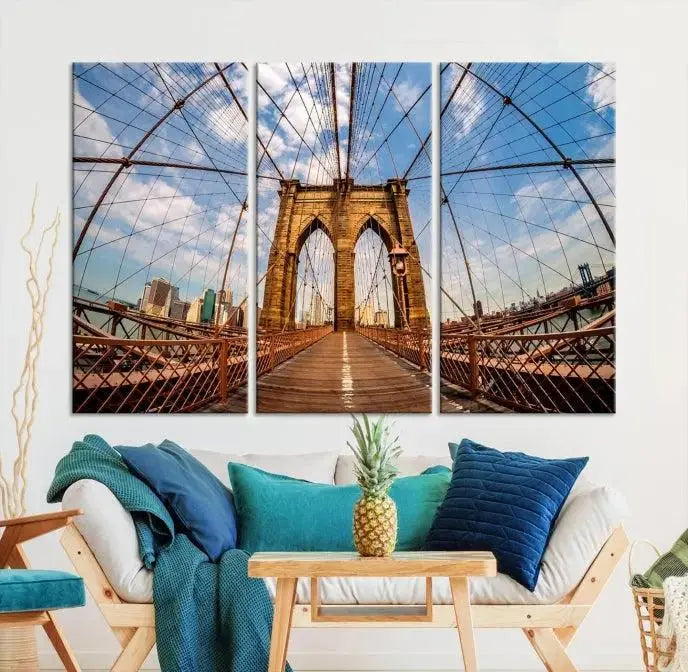 The Brooklyn Bridge Manhattan Wall Art Canvas Print, featuring three panels on museum-quality canvas with UV protection, hangs as an effortlessly elegant focal point in a minimalist living room.