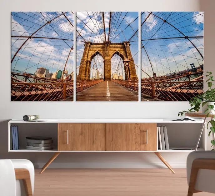 The Brooklyn Bridge Manhattan Wall Art Canvas Print, featuring three panels on museum-quality canvas with UV protection, hangs as an effortlessly elegant focal point in a minimalist living room.