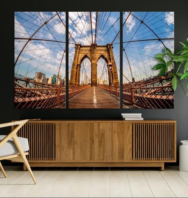 The Brooklyn Bridge Manhattan Wall Art Canvas Print, featuring three panels on museum-quality canvas with UV protection, hangs as an effortlessly elegant focal point in a minimalist living room.