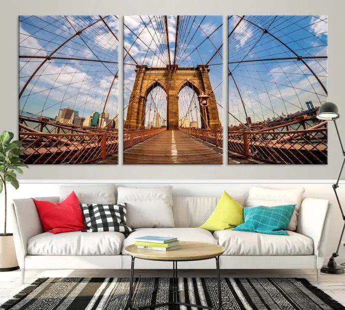 The Brooklyn Bridge Manhattan Wall Art Canvas Print, featuring three panels on museum-quality canvas with UV protection, hangs as an effortlessly elegant focal point in a minimalist living room.