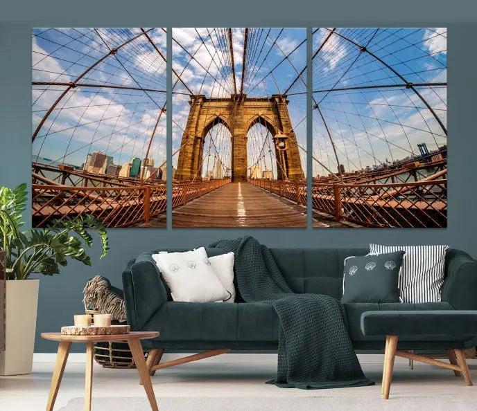 The Brooklyn Bridge Manhattan Wall Art Canvas Print, featuring three panels on museum-quality canvas with UV protection, hangs as an effortlessly elegant focal point in a minimalist living room.