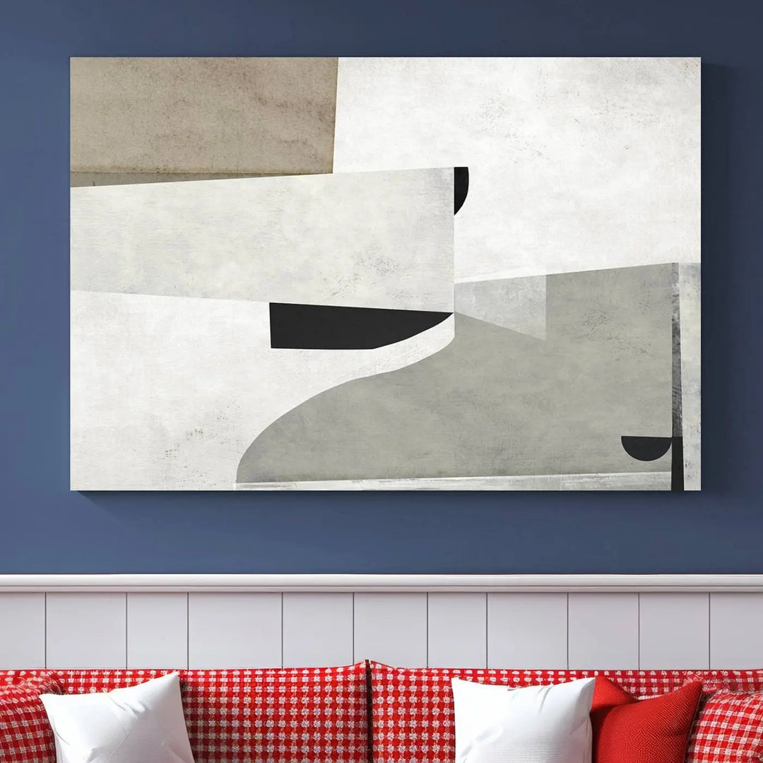 The Brown Gray Figures Abstract Wall Art Canvas Print is displayed as a triptych on a dark wall. The piece is gallery wrapped, offering a seamless finish and enhanced durability due to its UV-protective coating.