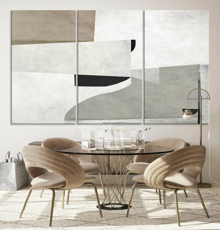 The Brown Gray Figures Abstract Wall Art Canvas Print is displayed as a triptych on a dark wall. The piece is gallery wrapped, offering a seamless finish and enhanced durability due to its UV-protective coating.