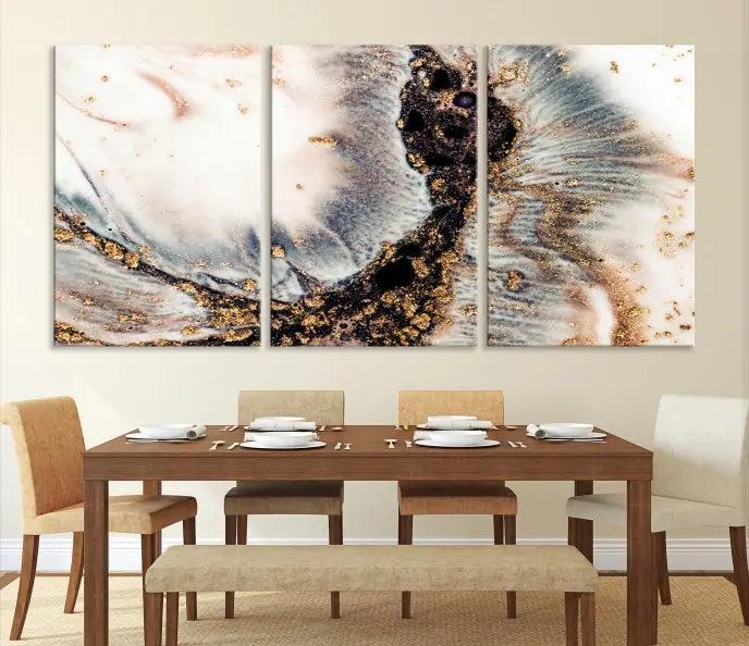 The Brown Marble Fluid Effect Wall Art Abstract Canvas Wall Art Print, with its mesmerizing black, white, and gold swirls, brings an exquisite touch to the space. This museum-quality canvas is elegantly displayed in a modern living room setting.