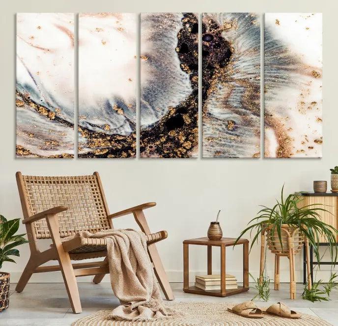 The Brown Marble Fluid Effect Wall Art Abstract Canvas Wall Art Print, with its mesmerizing black, white, and gold swirls, brings an exquisite touch to the space. This museum-quality canvas is elegantly displayed in a modern living room setting.