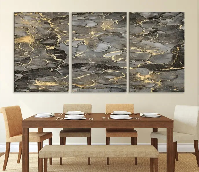 The Brown Yellow Marble Fluid Effect Abstract Canvas Wall Art Print, expertly wrapped on museum-quality canvas, enhances the dark wall with intricate gold and gray swirls.