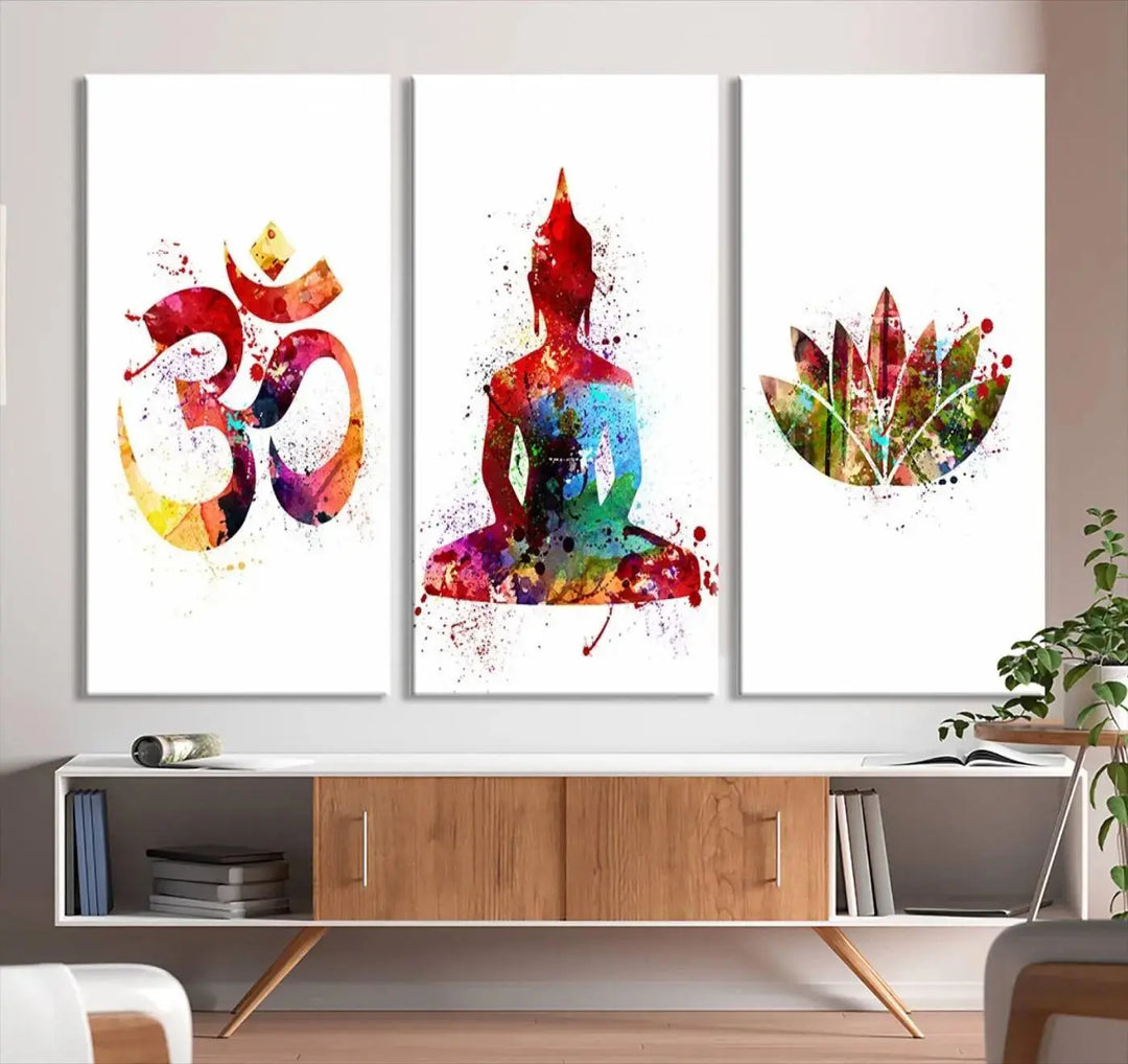 The Buddha Canvas, featuring Asian Wall Art and Yoga Medit Canvas Print designs with an Om symbol, a meditating Buddha, and a lotus, adds a touch of serenity to the space.