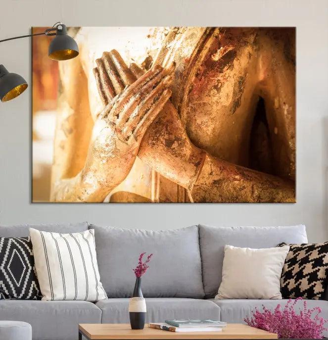 This Buddha Statue Hands Wall Art Canvas Print features a weathered golden Buddha statue with folded hands, crafted on museum-quality canvas and protected with a UV coating. Experience the elegance and tranquility of this piece with free shipping included.