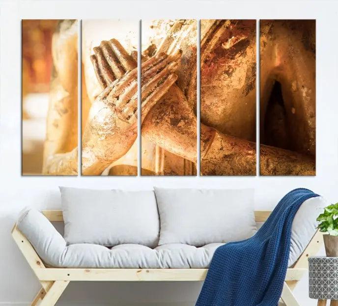 This Buddha Statue Hands Wall Art Canvas Print features a weathered golden Buddha statue with folded hands, crafted on museum-quality canvas and protected with a UV coating. Experience the elegance and tranquility of this piece with free shipping included.