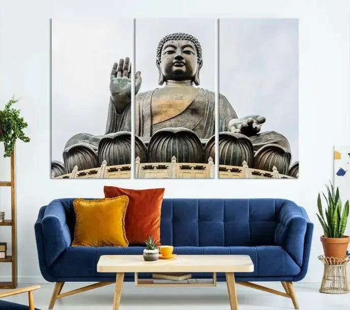 The living room features the Buddha Statue Wall Art Canvas Print, a museum-quality triptych of a large seated Buddha statue on UV-protective canvas.