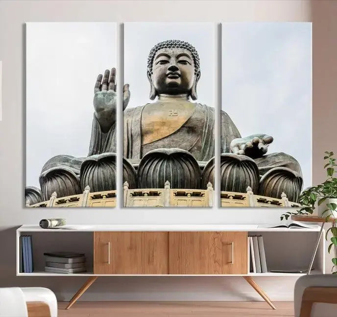 The living room features the Buddha Statue Wall Art Canvas Print, a museum-quality triptych of a large seated Buddha statue on UV-protective canvas.