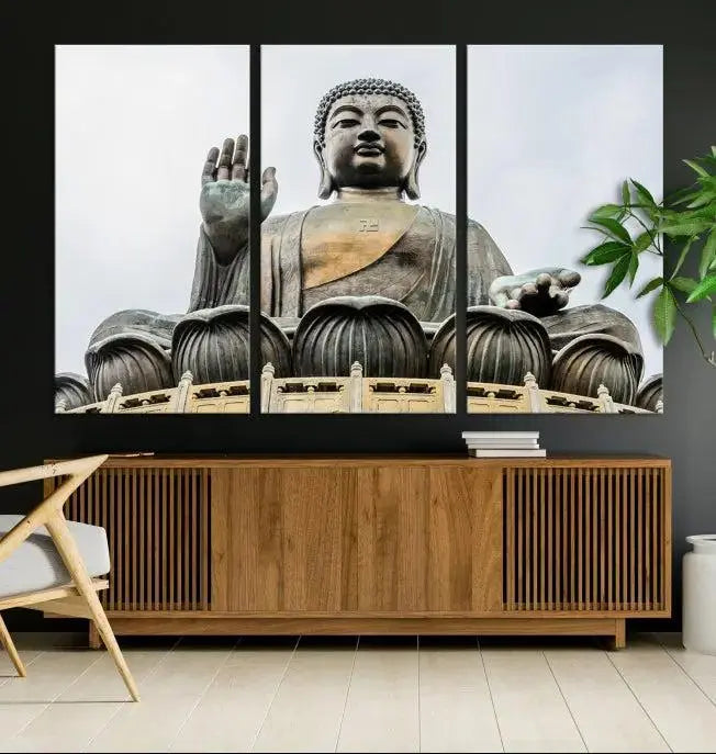 The living room features the Buddha Statue Wall Art Canvas Print, a museum-quality triptych of a large seated Buddha statue on UV-protective canvas.