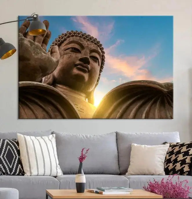 The Daylight Wall Art Canvas Print features a large Buddha statue with a serene expression, set against a sunrise sky on museum-quality polycotton canvas. Designed for modern living room decor, this ready-to-hang artwork includes a UV-protective coating to ensure lasting vibrancy.