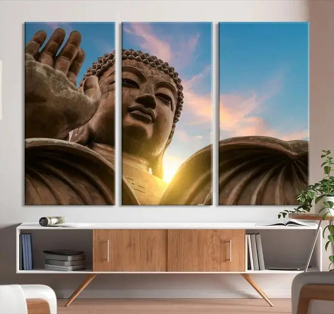 The Daylight Wall Art Canvas Print features a large Buddha statue with a serene expression, set against a sunrise sky on museum-quality polycotton canvas. Designed for modern living room decor, this ready-to-hang artwork includes a UV-protective coating to ensure lasting vibrancy.