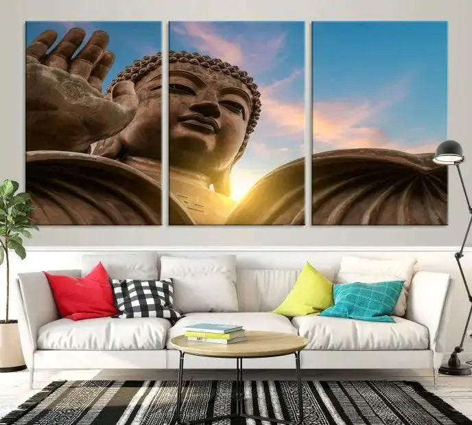 The Daylight Wall Art Canvas Print features a large Buddha statue with a serene expression, set against a sunrise sky on museum-quality polycotton canvas. Designed for modern living room decor, this ready-to-hang artwork includes a UV-protective coating to ensure lasting vibrancy.