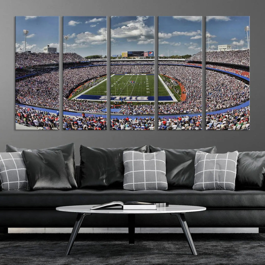 The wall features the Buffalo Bills Highmark Stadium Wall Art Canvas Print. This triple canvas captures the thrilling game day atmosphere of a packed football stadium during a Buffalo Bills NFL match.