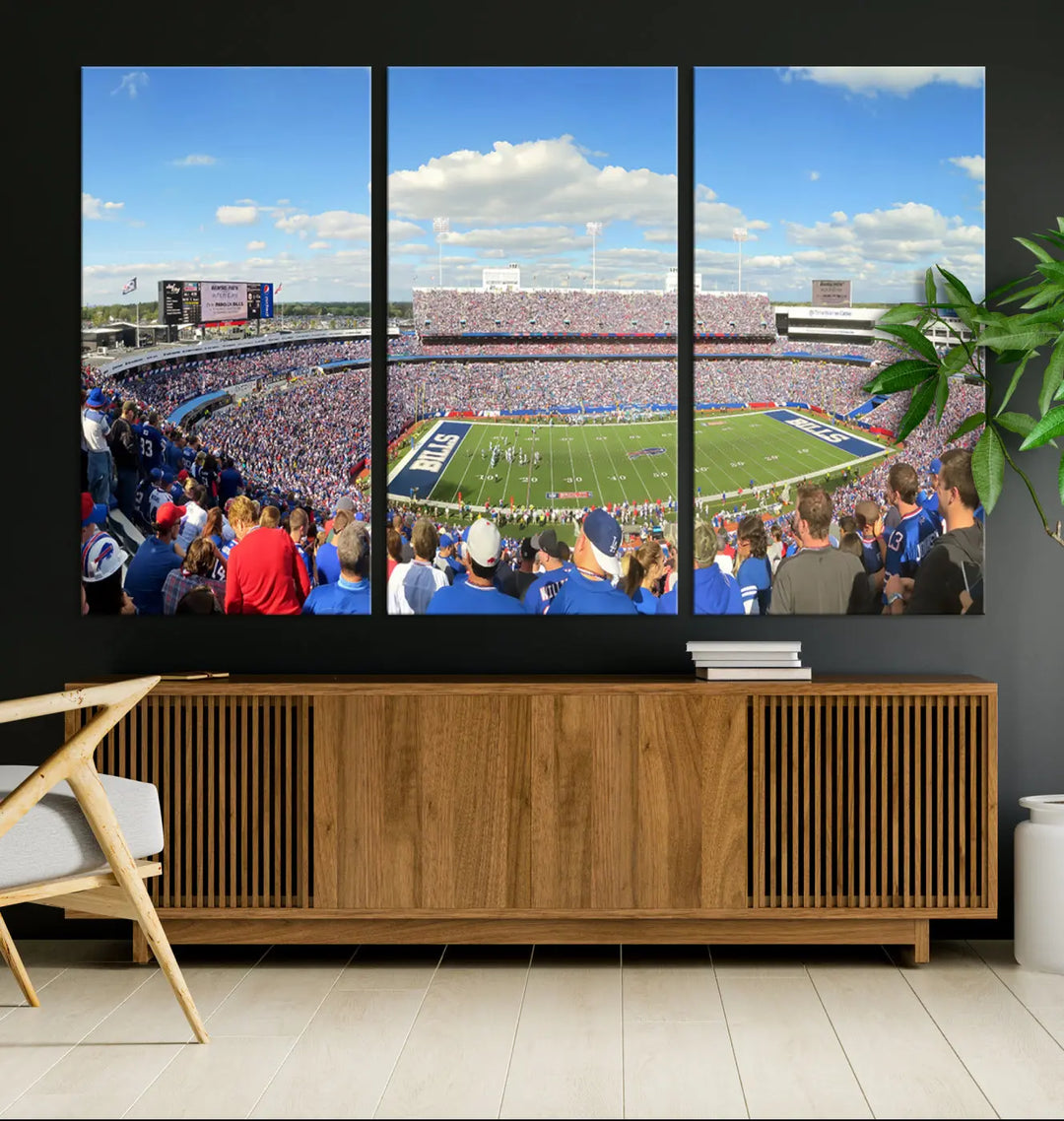 A Buffalo Bills NFL Football Team three-panel wall art canvas print, featuring a vibrant scene of fans gathering at the Buffalo Highmark Stadium during an exciting game.