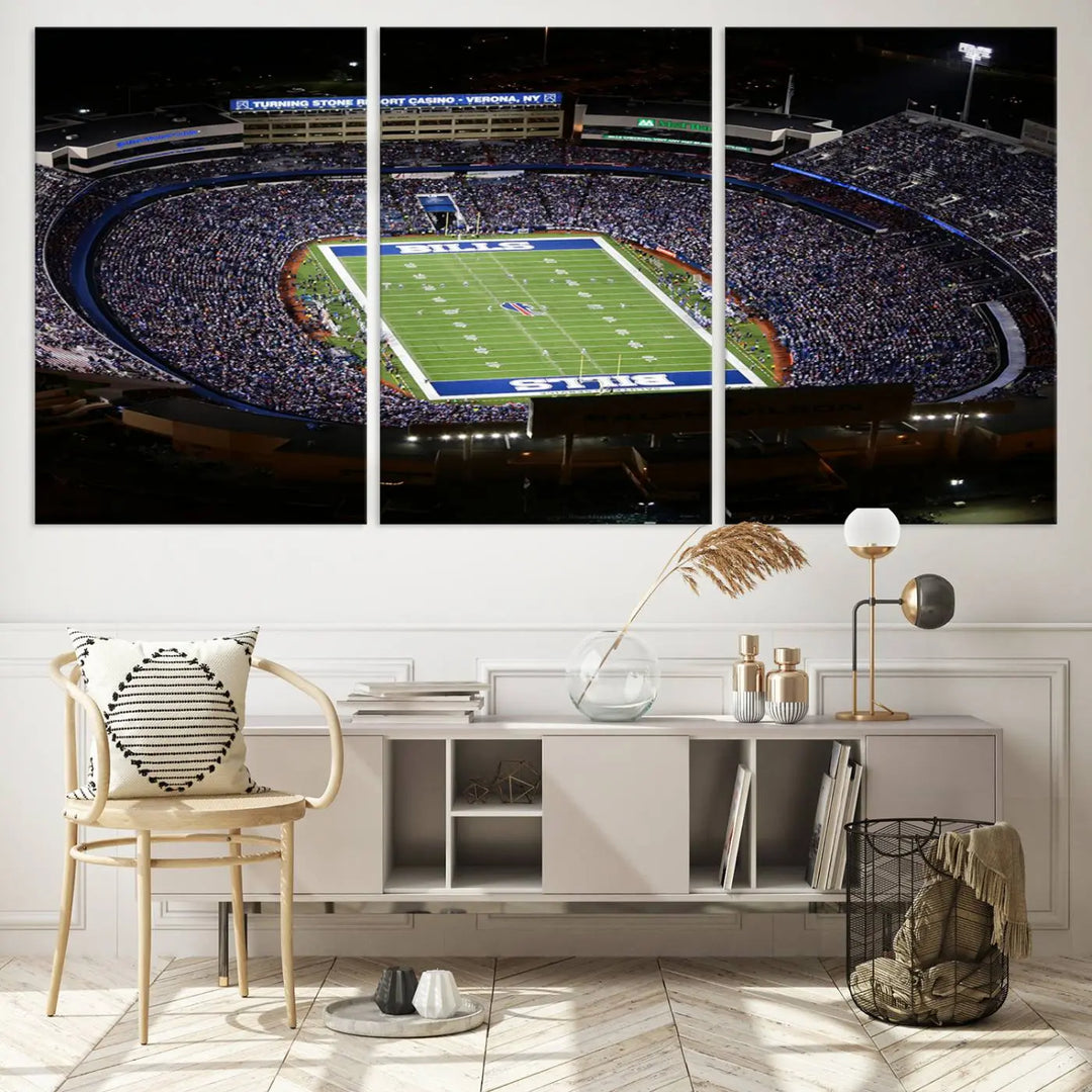 Above the couch hangs a museum-quality triptych featuring the Buffalo Bills NFL Football Team: a stunning canvas print of Highmark Stadium packed with enthusiastic spectators at night. The high-resolution printing technique captures every detail to perfection, making it ready to hang and instantly elevate any space.