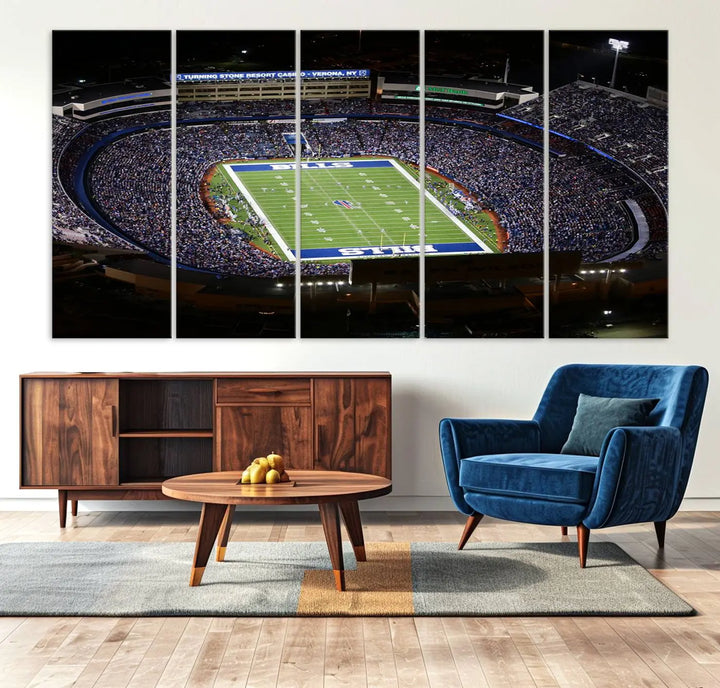 Above the couch hangs a museum-quality triptych featuring the Buffalo Bills NFL Football Team: a stunning canvas print of Highmark Stadium packed with enthusiastic spectators at night. The high-resolution printing technique captures every detail to perfection, making it ready to hang and instantly elevate any space.