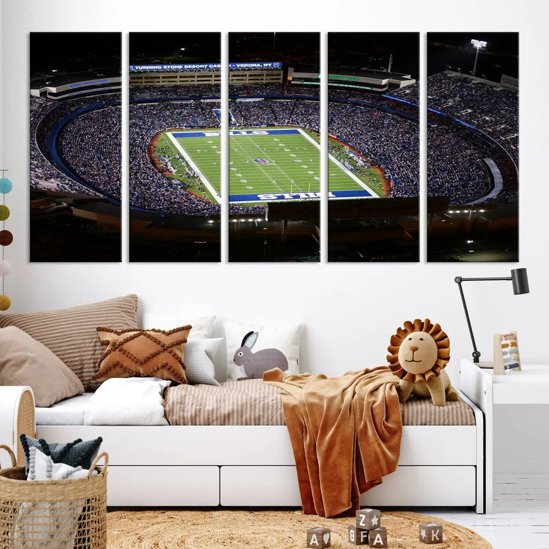 Above the couch hangs a museum-quality triptych featuring the Buffalo Bills NFL Football Team: a stunning canvas print of Highmark Stadium packed with enthusiastic spectators at night. The high-resolution printing technique captures every detail to perfection, making it ready to hang and instantly elevate any space.