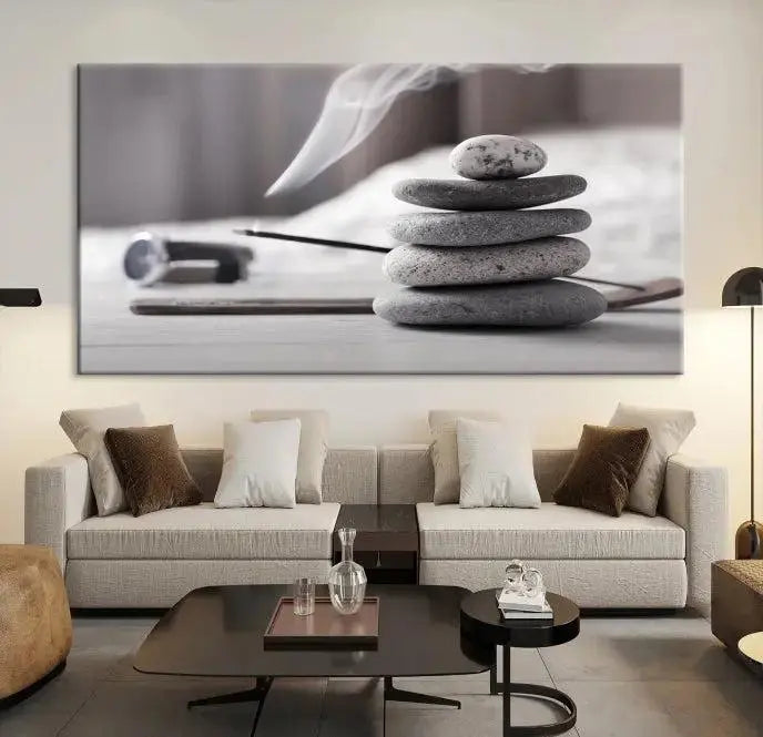 The "Burning Incense and Zen Stones Buddhism Wall Art Canvas Print" adds an artistic touch to the contemporary living room with its museum-quality depiction of stacked stones and incense smoke.