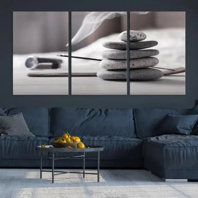 The "Burning Incense and Zen Stones Buddhism Wall Art Canvas Print" adds an artistic touch to the contemporary living room with its museum-quality depiction of stacked stones and incense smoke.