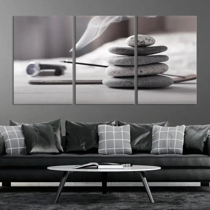 The "Burning Incense and Zen Stones Buddhism Wall Art Canvas Print" adds an artistic touch to the contemporary living room with its museum-quality depiction of stacked stones and incense smoke.