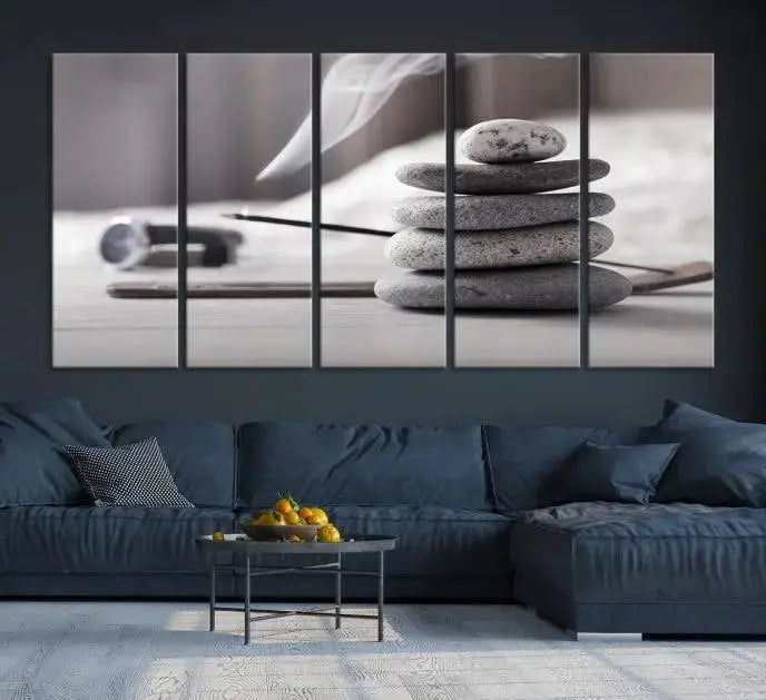 The "Burning Incense and Zen Stones Buddhism Wall Art Canvas Print" adds an artistic touch to the contemporary living room with its museum-quality depiction of stacked stones and incense smoke.