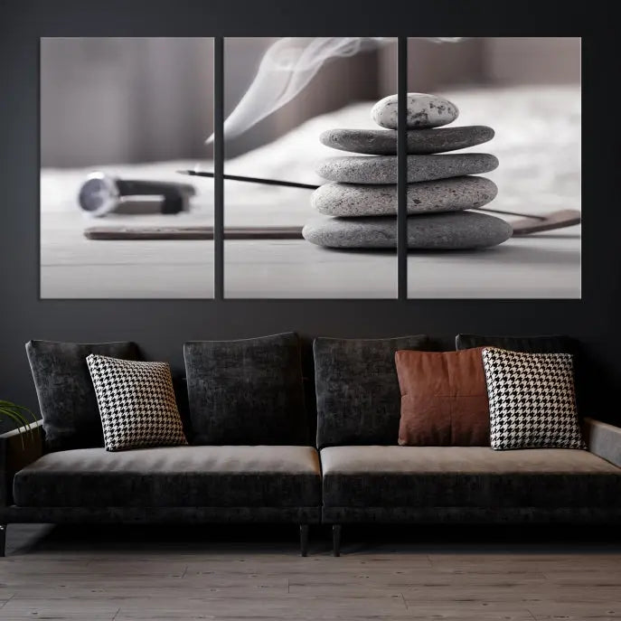 The "Burning Incense and Zen Stones Buddhism Wall Art Canvas Print" adds an artistic touch to the contemporary living room with its museum-quality depiction of stacked stones and incense smoke.