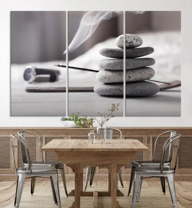 The "Burning Incense and Zen Stones Buddhism Wall Art Canvas Print" adds an artistic touch to the contemporary living room with its museum-quality depiction of stacked stones and incense smoke.