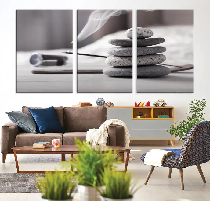 The "Burning Incense and Zen Stones Buddhism Wall Art Canvas Print" adds an artistic touch to the contemporary living room with its museum-quality depiction of stacked stones and incense smoke.