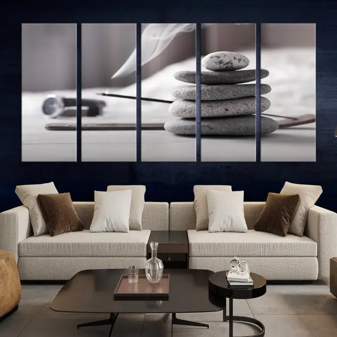 The "Burning Incense and Zen Stones Buddhism Wall Art Canvas Print" adds an artistic touch to the contemporary living room with its museum-quality depiction of stacked stones and incense smoke.