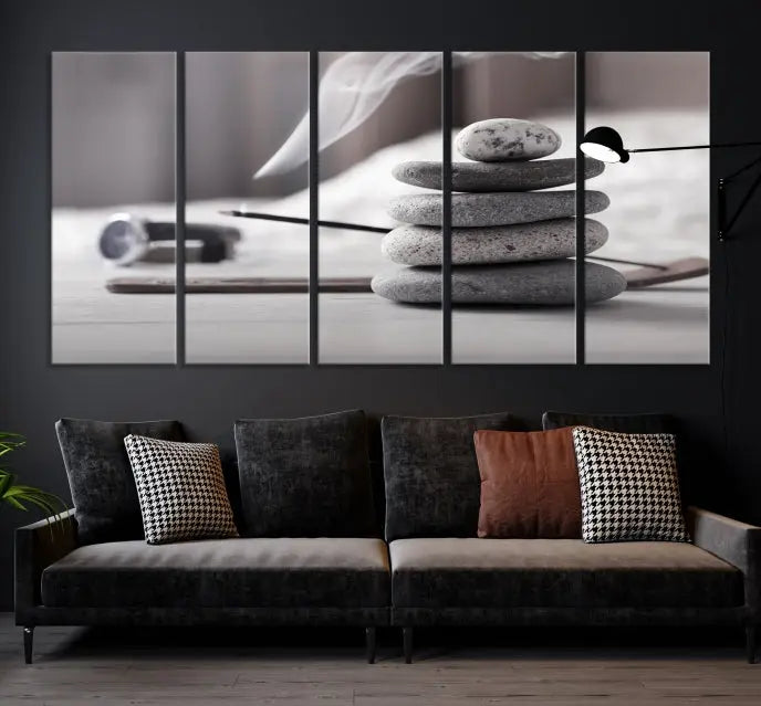 The "Burning Incense and Zen Stones Buddhism Wall Art Canvas Print" adds an artistic touch to the contemporary living room with its museum-quality depiction of stacked stones and incense smoke.