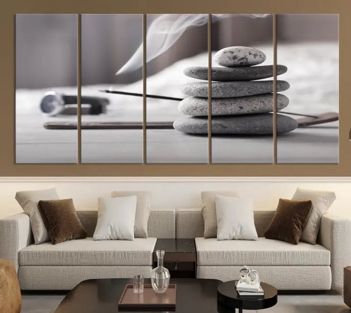 The "Burning Incense and Zen Stones Buddhism Wall Art Canvas Print" adds an artistic touch to the contemporary living room with its museum-quality depiction of stacked stones and incense smoke.